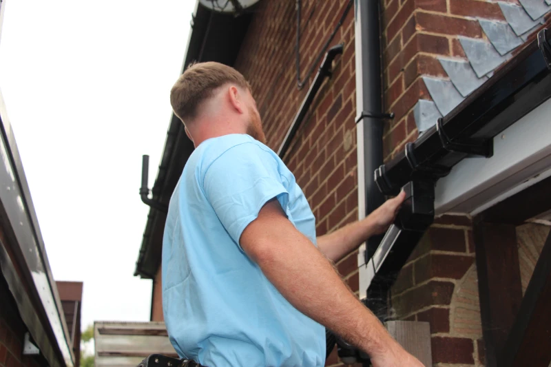 damaged downpipes repaired